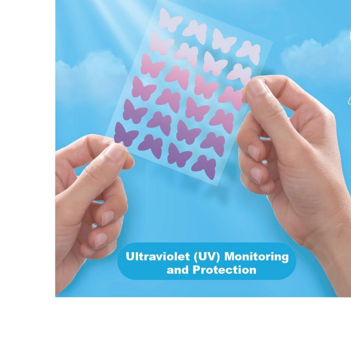 Hands holding UV color-change butterfly acne patches